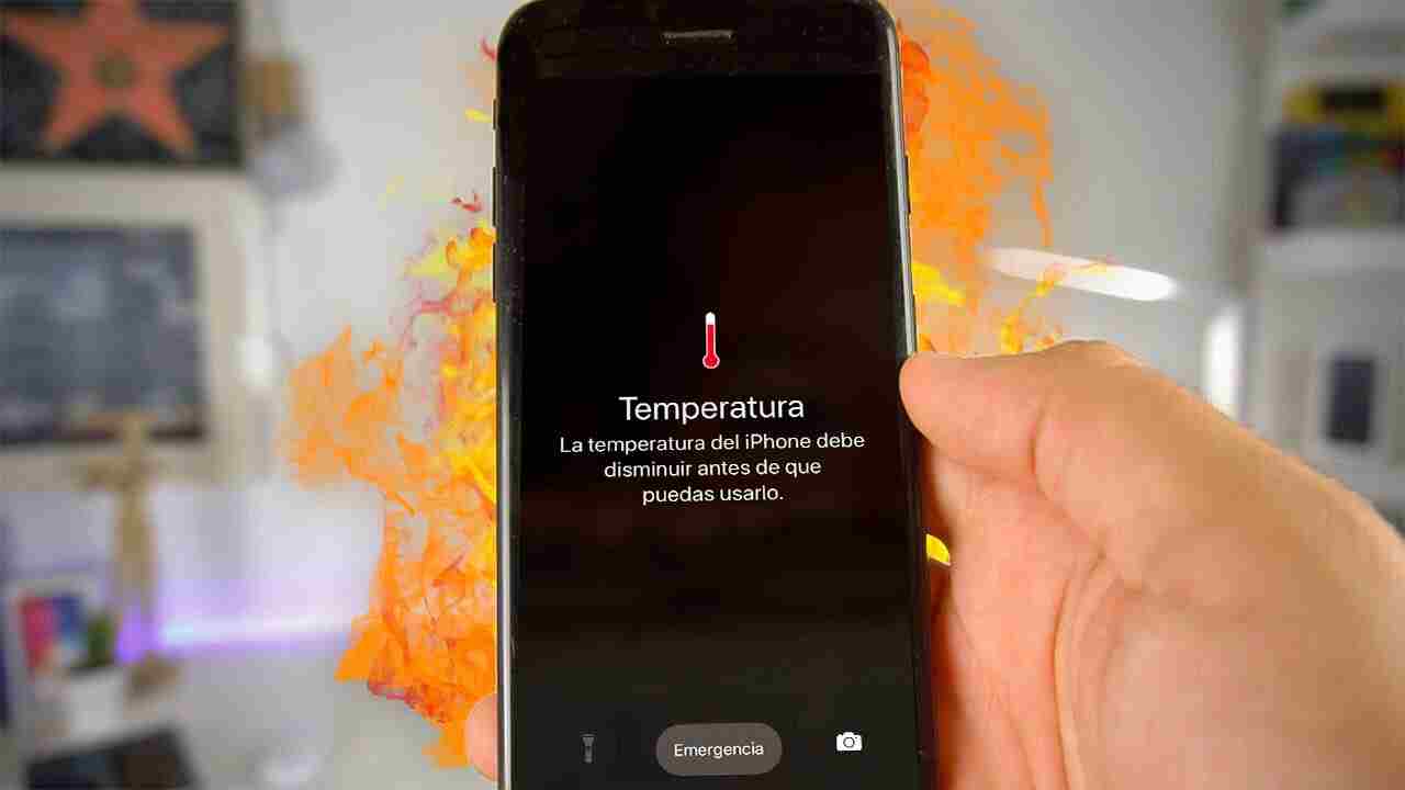 iPhone in mano che prende fuoco